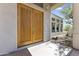 A close-up view of the front double doors, showcasing its design and solid construction at 28729 N 107Th St, Scottsdale, AZ 85262