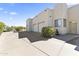 Detached three-car garage featuring plenty of parking and storage space with a driveway on a sunny day at 28729 N 107Th St, Scottsdale, AZ 85262