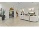 Spacious living room with tile flooring, a fireplace, and open floor plan at 28729 N 107Th St, Scottsdale, AZ 85262