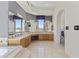 Well-lit bathroom with dual sinks, vanity, bathtub, and mountain views at 28729 N 107Th St, Scottsdale, AZ 85262