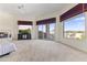 Spacious main bedroom suite with fireplace, balcony access, and scenic views at 28729 N 107Th St, Scottsdale, AZ 85262