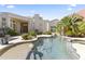 Backyard pool and patio surrounded by mature landscaping and desert foliage at 28729 N 107Th St, Scottsdale, AZ 85262