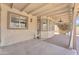 Relaxing covered patio with seating and sun shades, offering a shaded retreat at 3046 E Dover St, Mesa, AZ 85213