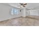 Spacious living area showcasing tile floors and lots of natural light at 3046 E Dover St, Mesa, AZ 85213