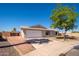 Charming single story home featuring a two car garage and a well maintained front yard at 3307 W Mescal St, Phoenix, AZ 85029