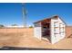Backyard featuring a storage shed and block wall that provides privacy at 3307 W Mescal St, Phoenix, AZ 85029