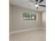 Bright bedroom featuring a ceiling fan, natural light, and neutral wall paint at 3538 W Sierra Vista Dr, Phoenix, AZ 85019