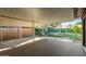 Covered patio with privacy lattice, metal posts, and lush backyard views at 3538 W Sierra Vista Dr, Phoenix, AZ 85019