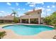 View of the private backyard with beautiful sparkling pool and a covered patio at 4002 N San Gabriel Cir, Mesa, AZ 85215