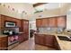Well-appointed kitchen with stainless steel appliances, granite countertops, and ample cabinet space at 4002 N San Gabriel Cir, Mesa, AZ 85215