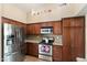 This kitchen is equipped with stainless steel appliances, granite counters, and ample cabinet storage at 4002 N San Gabriel Cir, Mesa, AZ 85215