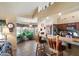 Inviting kitchen featuring granite countertops, stainless appliances, and a cozy breakfast bar at 4002 N San Gabriel Cir, Mesa, AZ 85215