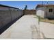 Backyard with a concrete slab surrounded by block fence at 4110 E Wagoner Rd, Phoenix, AZ 85032