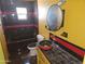 Bathroom showcasing a vintage sink, and black tiled shower at 4110 E Wagoner Rd, Phoenix, AZ 85032