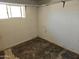 This is an empty bedroom with a window and white walls at 4110 E Wagoner Rd, Phoenix, AZ 85032
