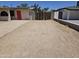 Spacious driveway and yard area providing ample parking and outdoor space in this home at 4110 E Wagoner Rd, Phoenix, AZ 85032