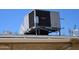 Air conditioning unit on top of the roof of this home at 4110 E Wagoner Rd, Phoenix, AZ 85032