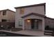 Covered patio in backyard with access to pool area, perfect for outdoor living and entertaining at 4145 E Santa Fe Ln, Gilbert, AZ 85297