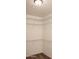 Walk-in closet with carpet floor and custom storage shelving at 4145 E Santa Fe Ln, Gilbert, AZ 85297