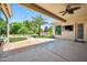 Outdoor patio with a ceiling fan, outdoor TV, and spacious backyard at 422 E Kaibab Pl, Chandler, AZ 85249