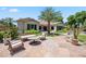 Inviting back patio with stone pavers, stylish outdoor furniture, and lush landscaping, a perfect outdoor retreat at 422 E Kaibab Pl, Chandler, AZ 85249