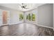 Bright bedroom with light gray walls, and triple windows framing an attractive view at 422 E Kaibab Pl, Chandler, AZ 85249