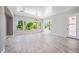 Sun-filled living room with large windows offering picturesque views and stylish tile floors at 422 E Kaibab Pl, Chandler, AZ 85249