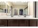 Bathroom with double vanity and framed mirror at 4705 E Red Oak Ln # 101, Gilbert, AZ 85297