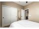 Bright bedroom features a neutral color palette, closet, and ensuite bathroom at 4705 E Red Oak Ln # 101, Gilbert, AZ 85297