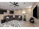Inviting living room with a comfortable sectional sofa and open layout to the kitchen at 4705 E Red Oak Ln # 101, Gilbert, AZ 85297