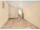 Large bonus room featuring neutral paint and a door leading to backyard at 5649 W Holly St, Phoenix, AZ 85035