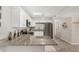 Well-lit kitchen with granite countertops, stainless steel appliances, and modern white cabinets at 5649 W Holly St, Phoenix, AZ 85035