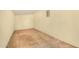 Unfinished room with painted walls and concrete floor at 5649 W Holly St, Phoenix, AZ 85035