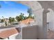 View from balcony of condo featuring red brick paved street and single car garage at 6138 N 28Th St, Phoenix, AZ 85016