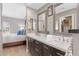 Beautiful bathroom features dual sinks, dark wood cabinets, and an additional storage area at 6138 N 28Th St, Phoenix, AZ 85016