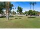 Expansive grassy area in the neighborhood with trees, gazebo and park benches at 6138 N 28Th St, Phoenix, AZ 85016
