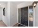 View of front door featuring a black door with stained glass side panels at 6138 N 28Th St, Phoenix, AZ 85016