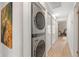 Convenient laundry area with modern stacked washer and dryer and ample storage at 6138 N 28Th St, Phoenix, AZ 85016