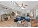 Spacious living room featuring a fireplace, vaulted ceilings, and seamless access to dining at 6138 N 28Th St, Phoenix, AZ 85016