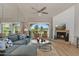 The comfortable living room features a fireplace, balcony access, and neutral decor at 6138 N 28Th St, Phoenix, AZ 85016