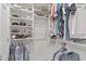 Well-organized walk-in closet with shelving and hanging space for clothes and shoes at 6138 N 28Th St, Phoenix, AZ 85016