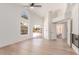 Spacious living room features bright white walls and a sliding glass door to the patio at 6439 E Redmont Dr, Mesa, AZ 85215