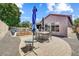 Inviting backyard featuring a paved patio, outdoor seating, and views of the pool at 776 W Carob Way, Chandler, AZ 85248