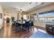 Spacious dining room with hardwood floors and views of the pool at 776 W Carob Way, Chandler, AZ 85248