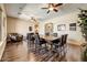 Large dining area with hardwood floors, ceiling fans, and ample natural light at 776 W Carob Way, Chandler, AZ 85248