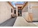 Inviting entrance with a bench, brick walkway, and secure front door at 776 W Carob Way, Chandler, AZ 85248