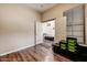 Office with hardwood floors, natural light, and double door entrance at 776 W Carob Way, Chandler, AZ 85248