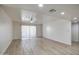 Large living room with light-colored floors, neutral walls, recessed lighting and access to the outdoor space at 7920 E Camelback Rd # 609, Scottsdale, AZ 85251