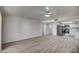 Open-concept living room flowing into the kitchen, features light-colored floors and neutral walls at 7920 E Camelback Rd # 609, Scottsdale, AZ 85251