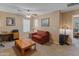 Cozy bonus room with neutral walls, a ceiling fan and a versatile sitting area at 8259 W Carol Ave, Peoria, AZ 85345